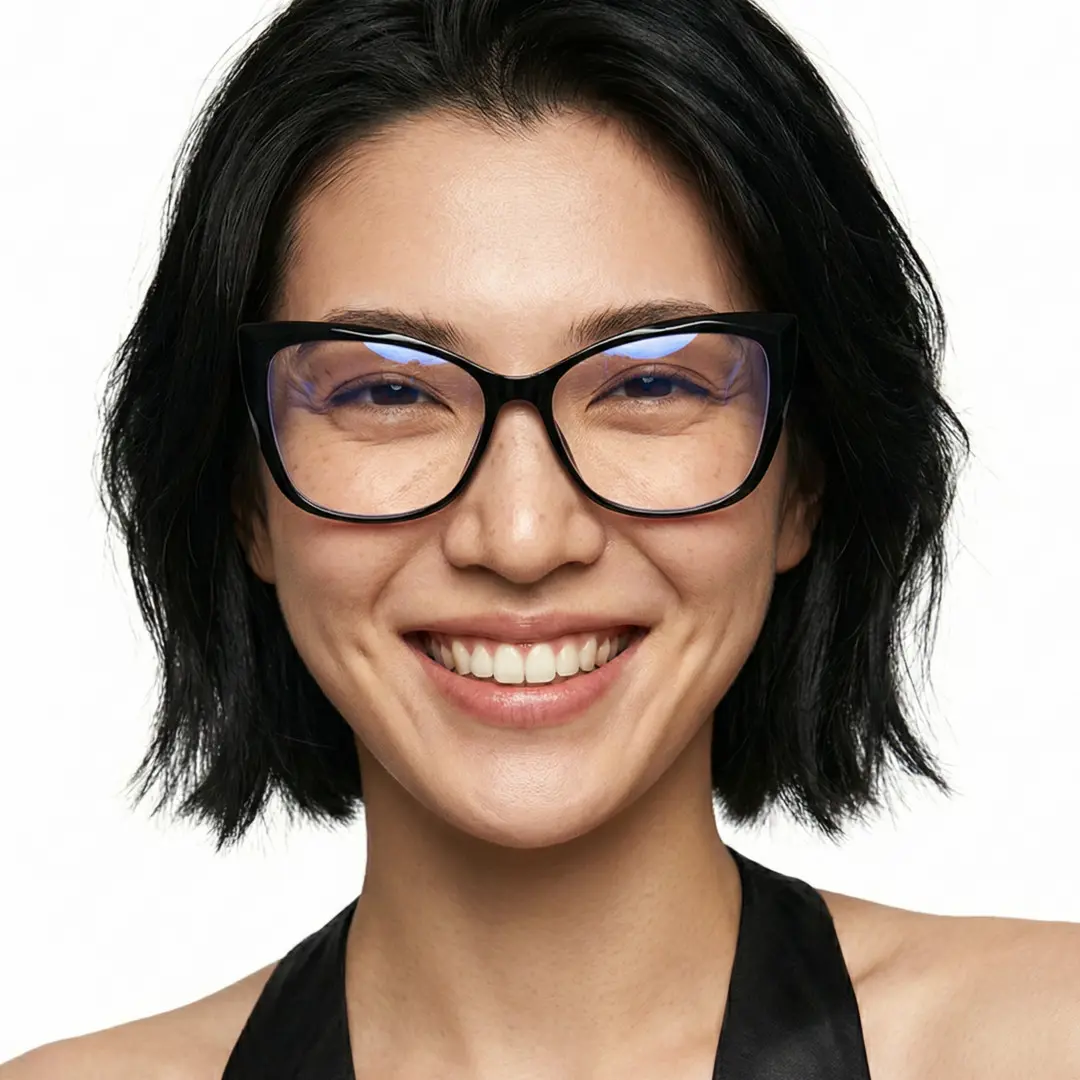Close-up view of female wearing black cat eye eyeglasses, smiling, CP0062209