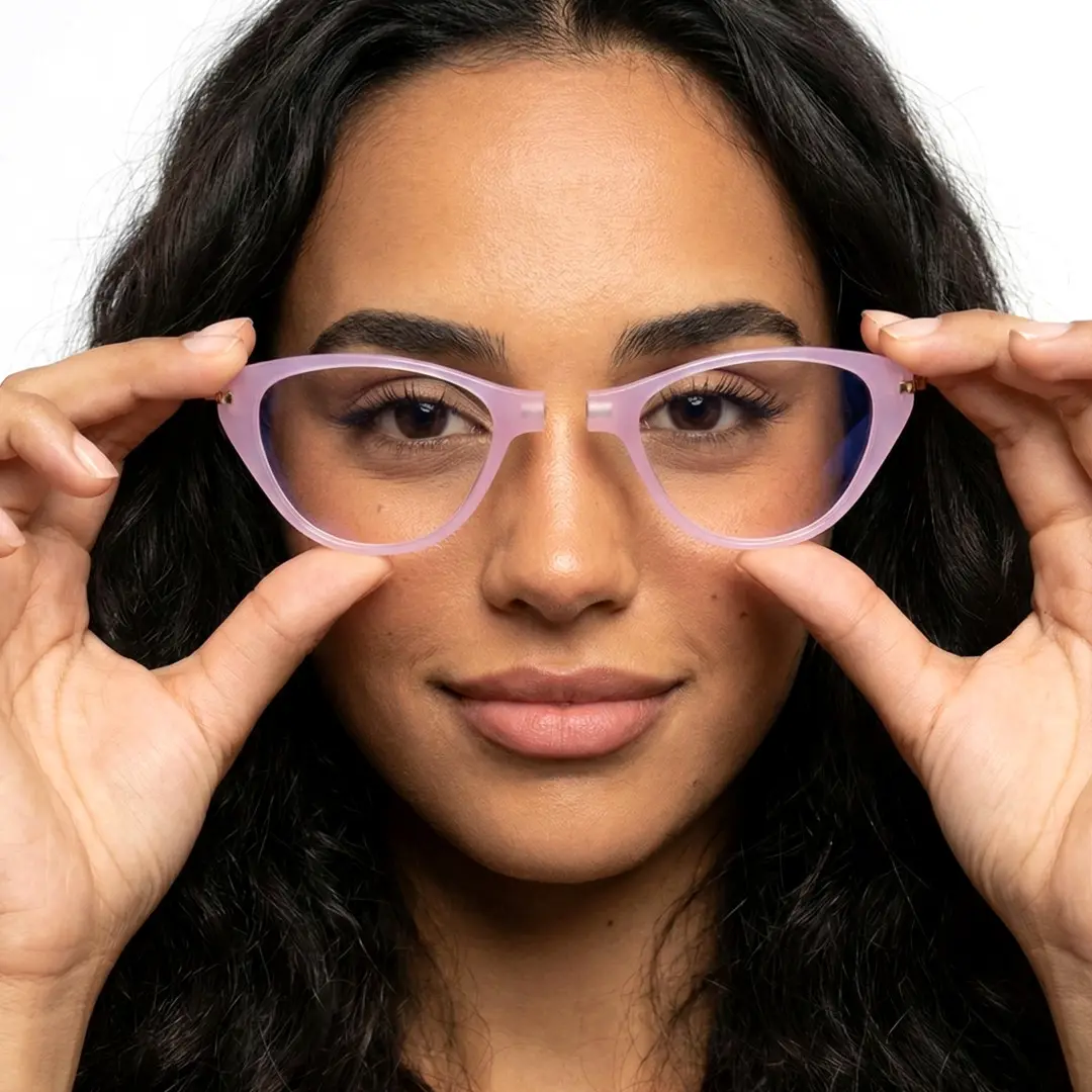 Front view of female wearing purple cat eye magnetic clip-on eyeglasses, adjusting glasses, neutral expression, CP0072512