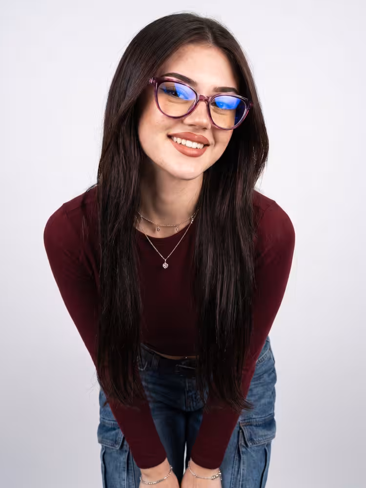 Female model wearing everyday purple cat eye pc eyeglasses in a clean studio setting. SPU: CP0082605