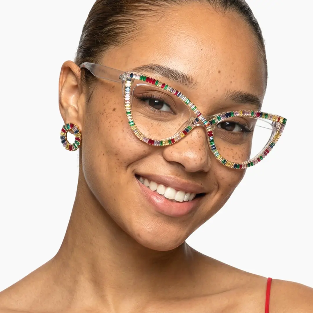 Portrait view of female wearing multicolor cat eye eyeglasses, tilting head, natural smile, CP0322412