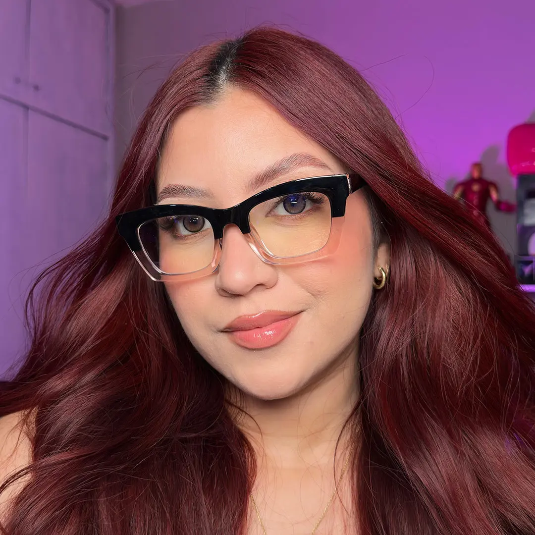 Front view of female wearing black cat eye eyeglasses, natural expression, CR0012209