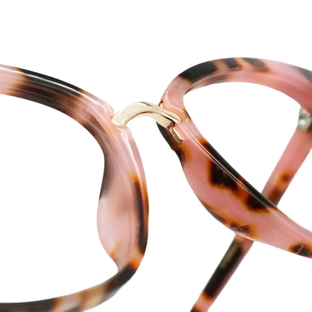 Integrated nose pad detail of Chandrikar vintage cat eye tr90 eyeglasses in red tortoise. SPU: CR0012211