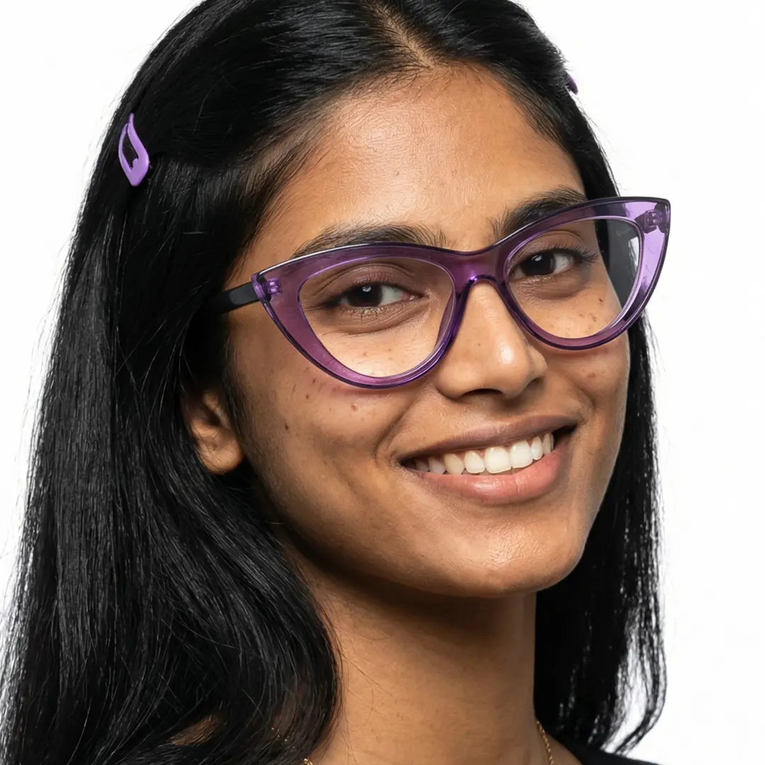 Face close-up view of female wearing vintage purple cat eye eyeglasses, soft smile, CR0012307