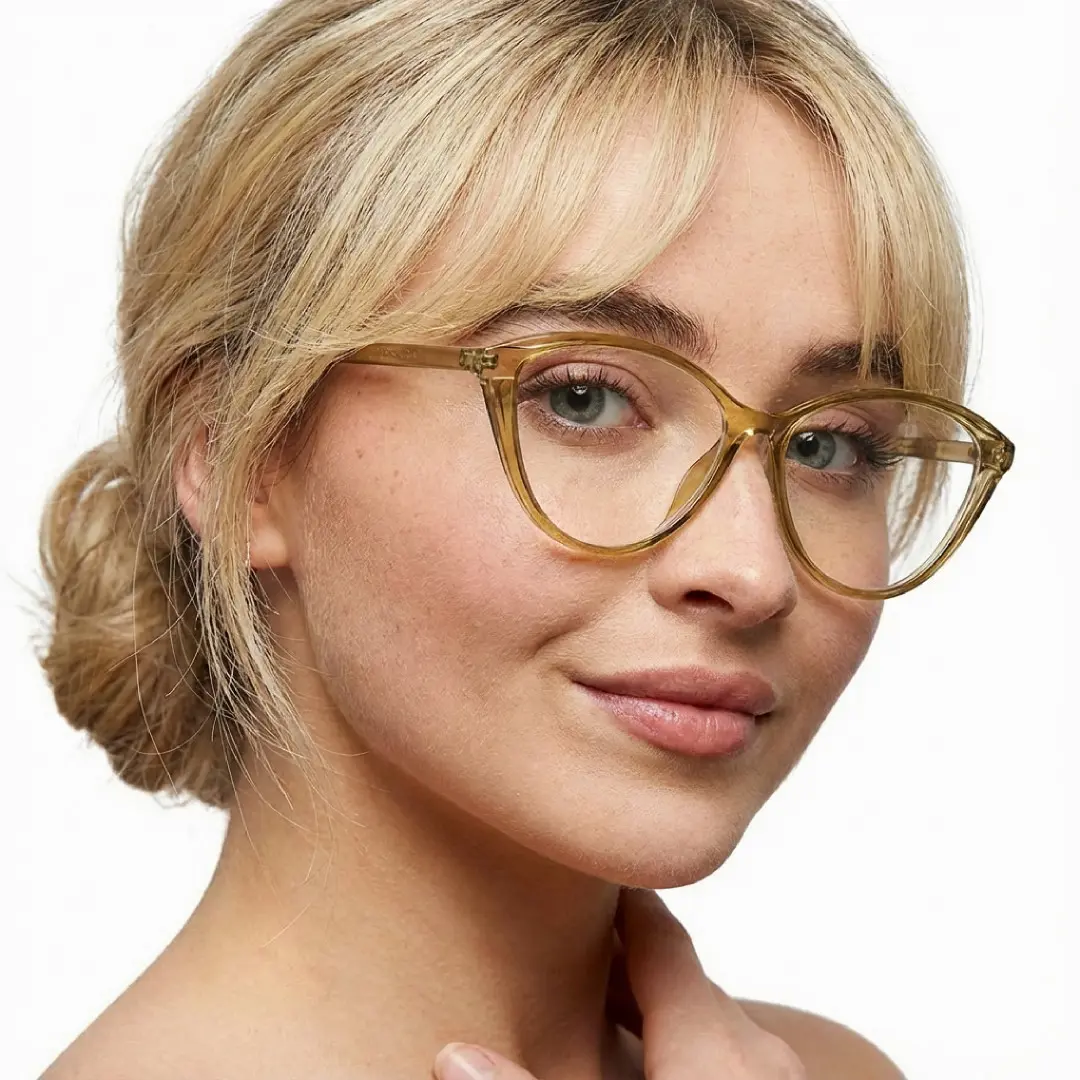 Profile view of female wearing green cat eye eyeglasses, natural smile, CR0012507
