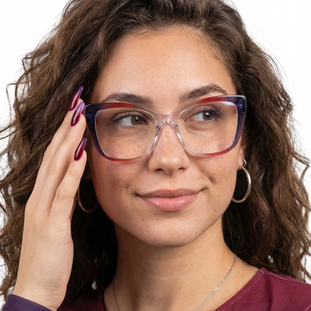 Front view of female wearing colorful purple cat eye eyeglasses, adjusting glasses, natural smile, CR0022402
