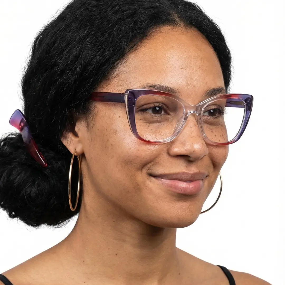 Profile view of female wearing colorful purple cat eye eyeglasses, soft smile, CR0022402