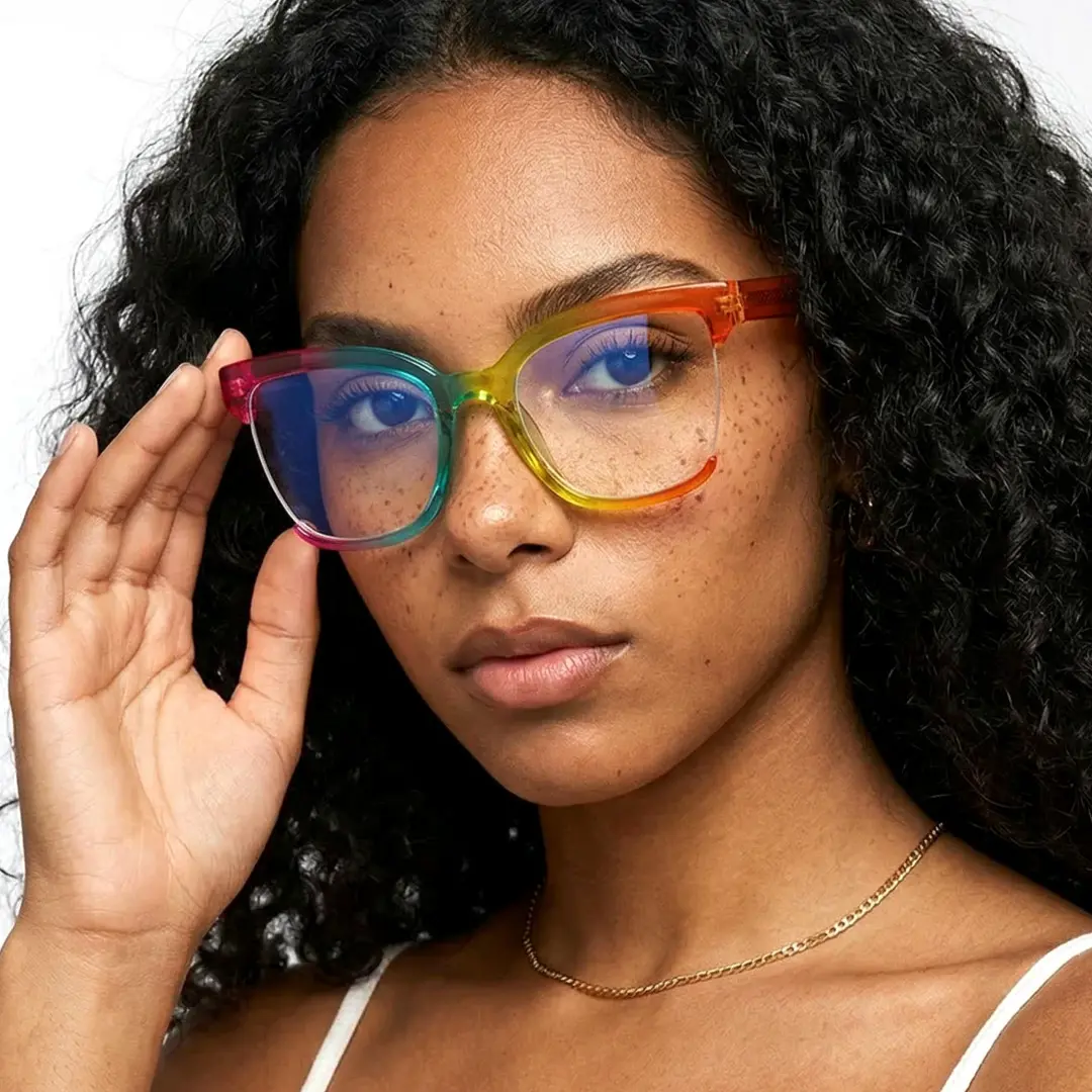 Three-quarter view of female wearing multicolor cat eye eyeglasses, touching frame, neutral expression, CR0022502
