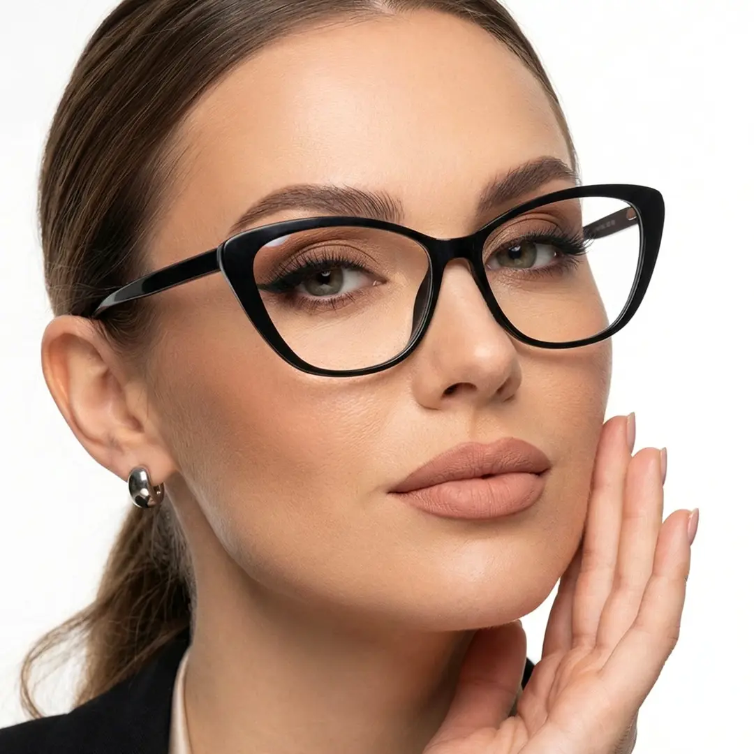 Three-quarter view of female wearing black cat eye magnetic clip-on eyeglasses set with interchangeable clip-on lenses, resting chin on hand, natural expression, CR0022512