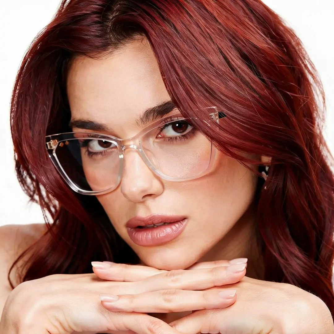 Front view of female wearing clear cat eye eyeglasses, relaxed expression, CR0042310