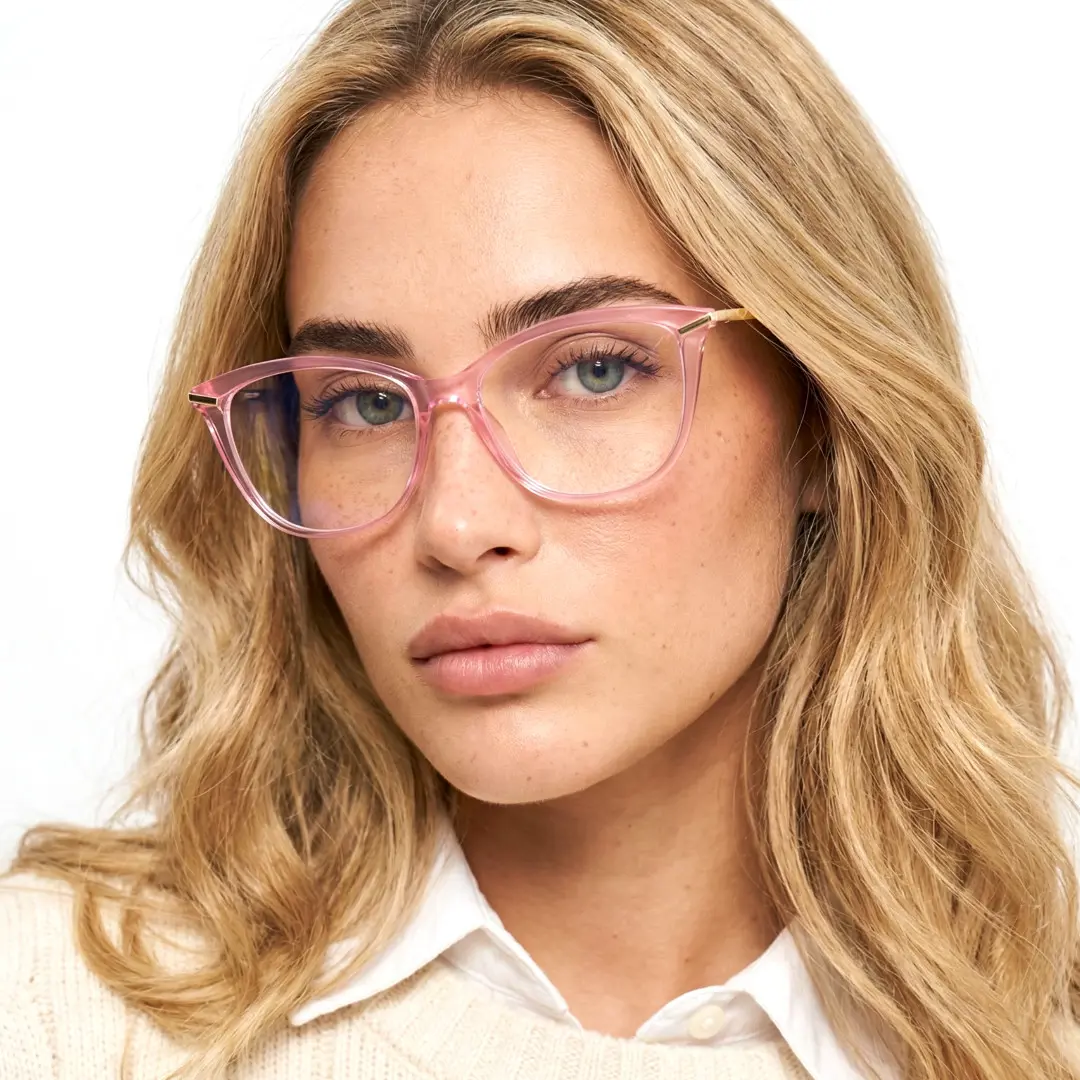 Front view of female wearing light pink cat eye eyeglasses, calm expression, CR0042404