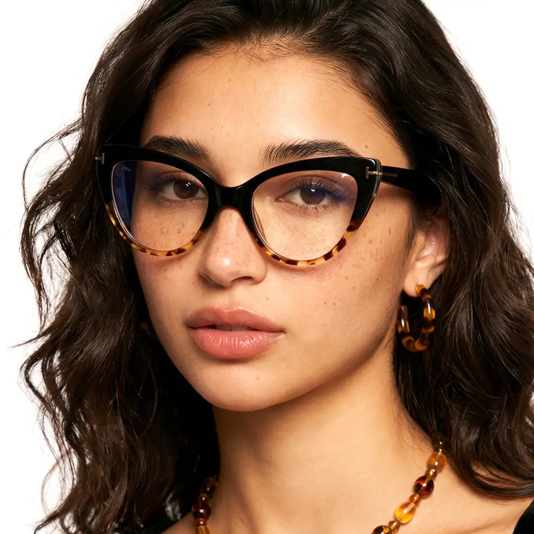 Slightly angled view of female wearing vintage tortoise cat eye eyeglasses, neutral expression, CR0062308