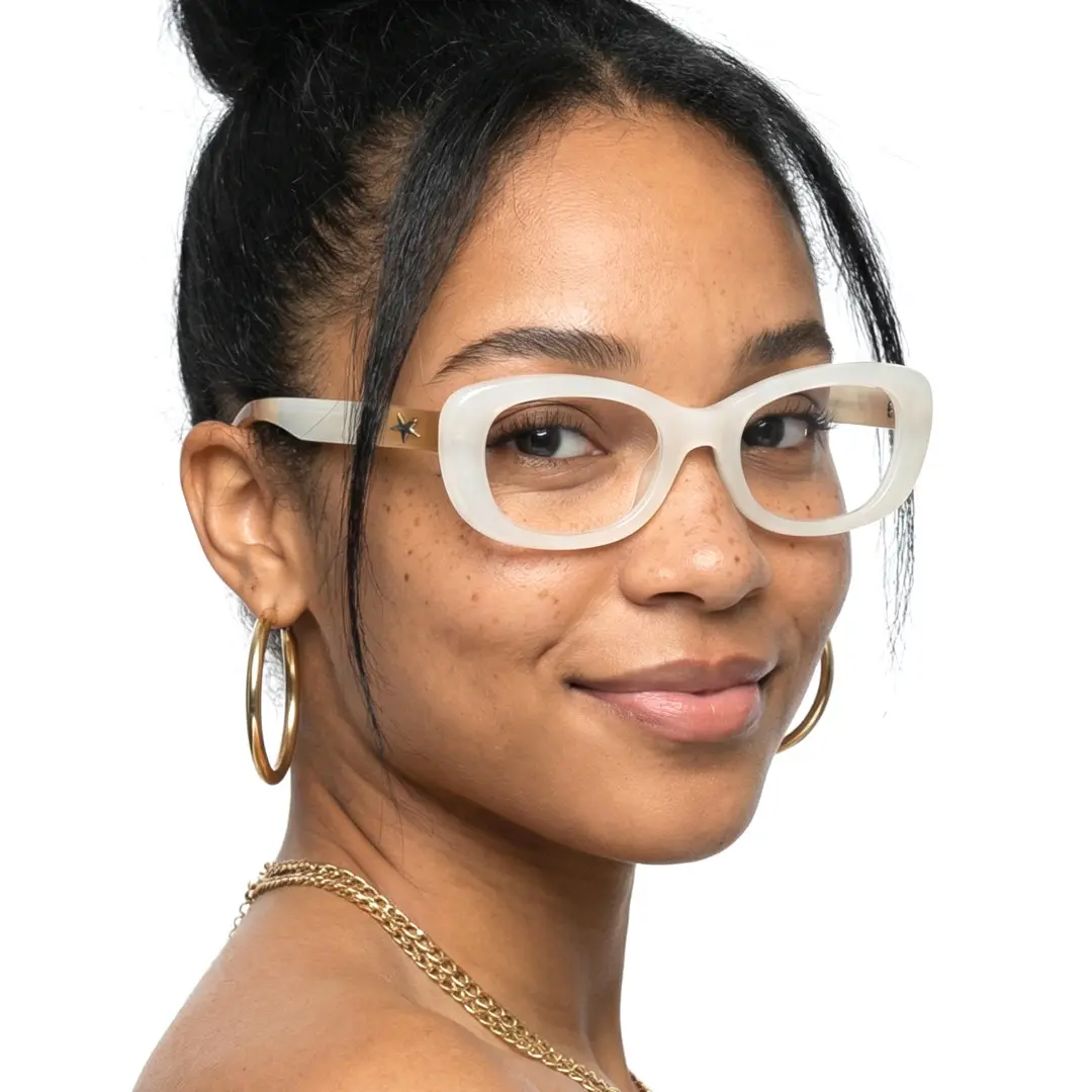 Over-the-shoulder view of female wearing white cat eye eyeglasses, natural expression, CR0062408