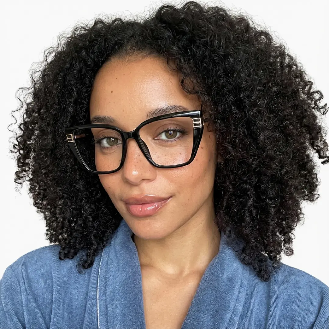 Three-quarter view of female wearing black cat eye eyeglasses, neutral expression, CR0082510