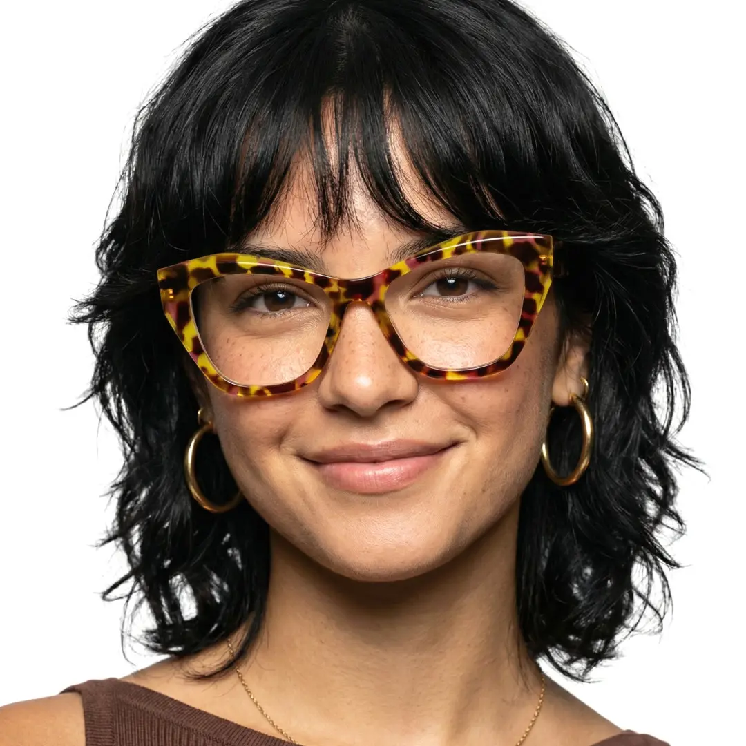 Front view of female wearing vintage yellow tortoise cat eye eyeglasses, natural smile, CR0102411