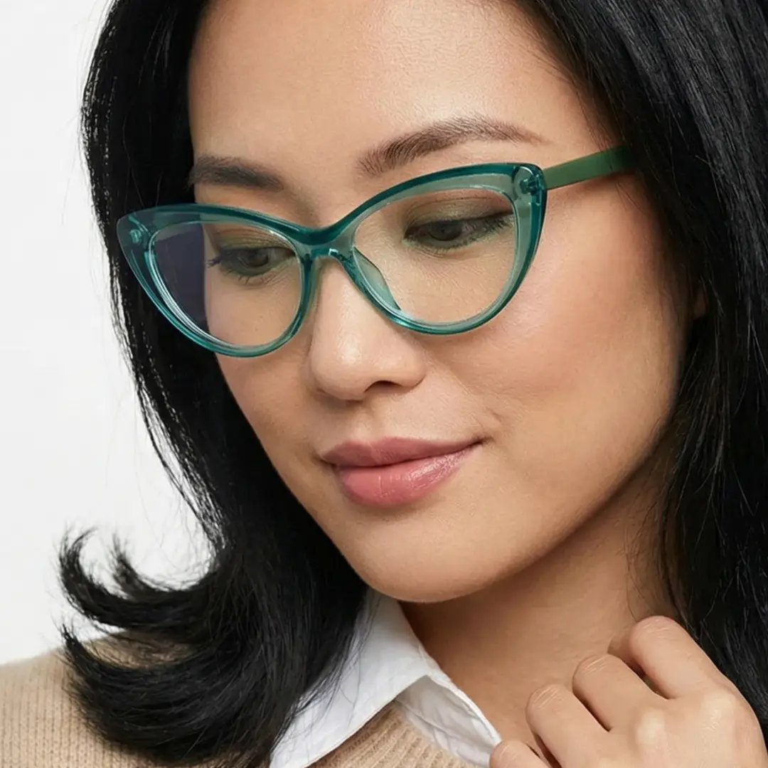Front view of female wearing green cat eye eyeglasses, relaxed expression, CR0102502