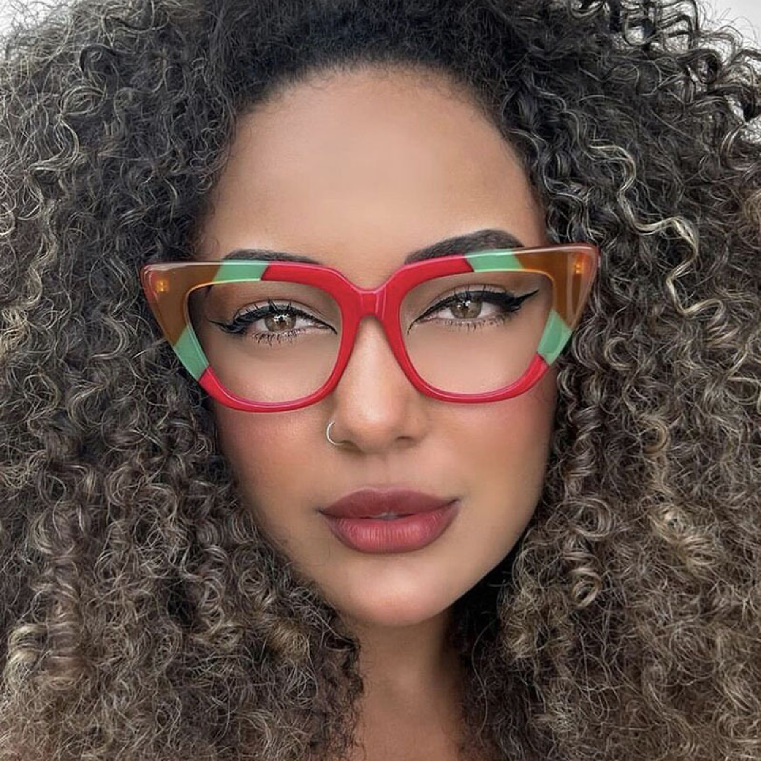 Front view of female wearing colorful multicolor cat eye eyeglasses, calm expression, CR0112307