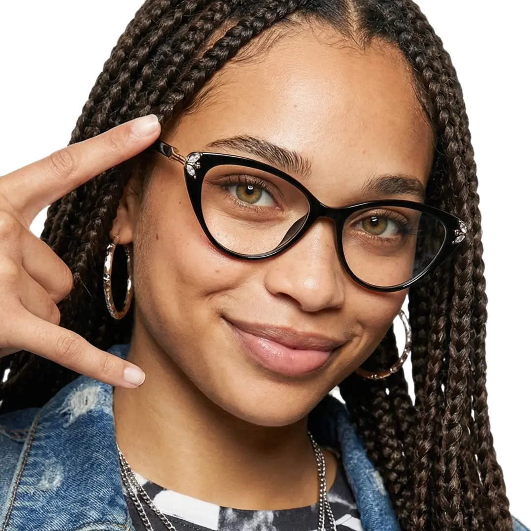 Looking straight ahead view of female wearing black cat eye eyeglasses, natural smile, CR0112510