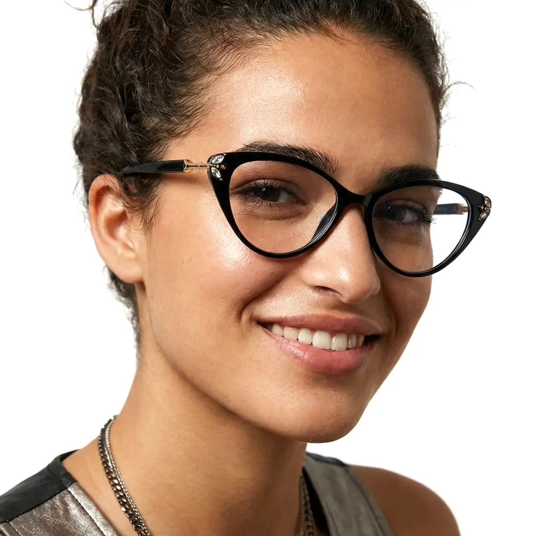 Three-quarter view of female wearing black cat eye eyeglasses, smiling, CR0112510