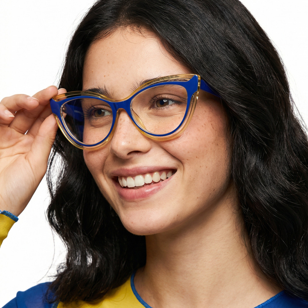 Looking away view of female wearing blue cat eye eyeglasses, adjusting glasses, smiling, CR0132408
