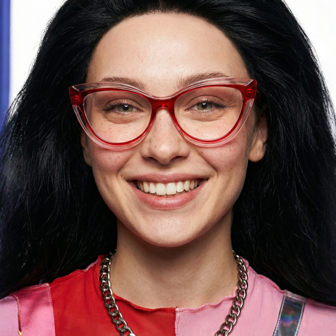 Front view of female wearing vintage pink cat eye eyeglasses, smiling, CR0132408