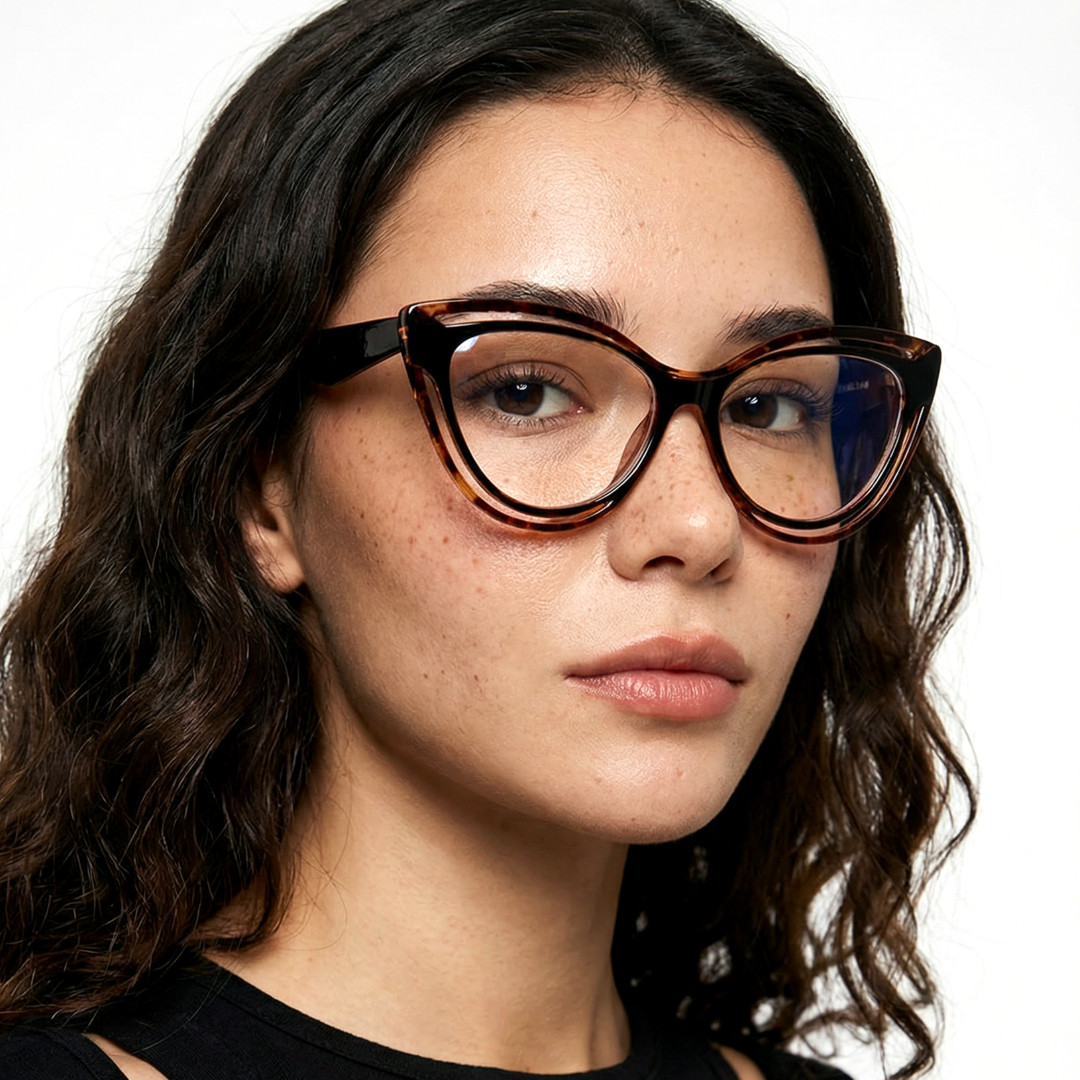Three-quarter view of female wearing vintage tortoise cat eye eyeglasses, calm expression, CR0132408