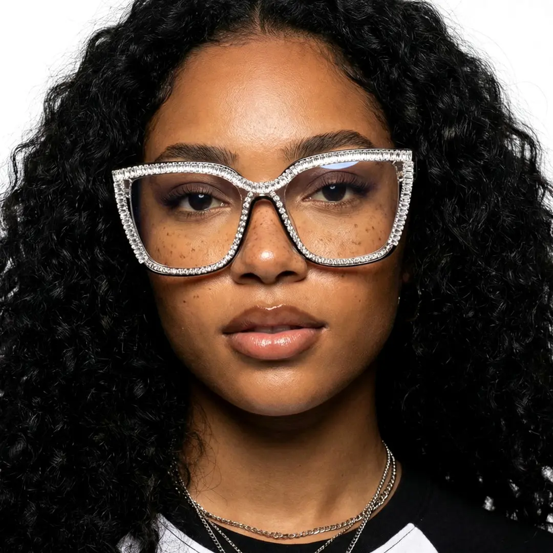 Front view of female wearing clear cat eye eyeglasses, neutral expression, CR0142401