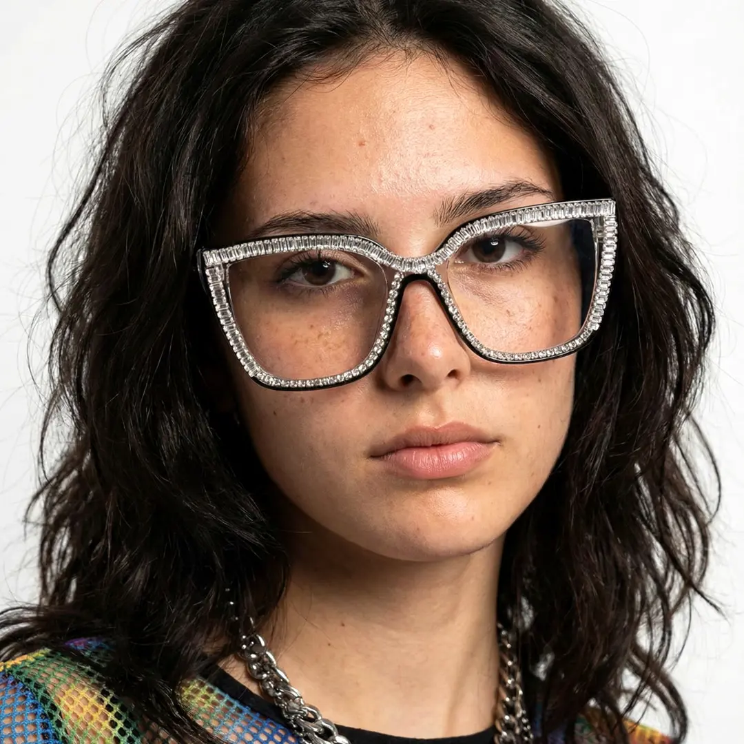 Looking straight ahead view of female wearing clear cat eye eyeglasses, natural expression, CR0142401