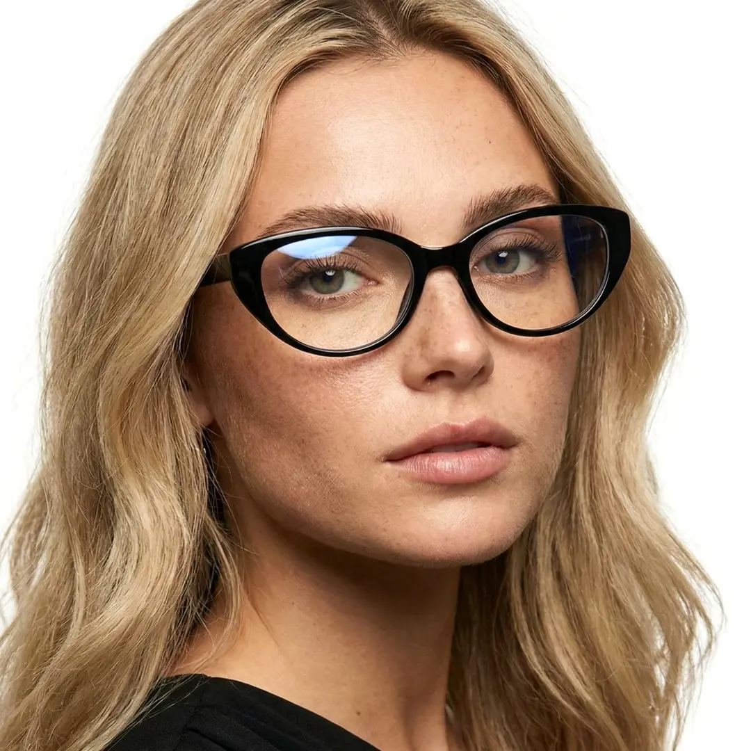 Looking straight ahead view of female wearing black cat eye eyeglasses, natural expression, CR0142404