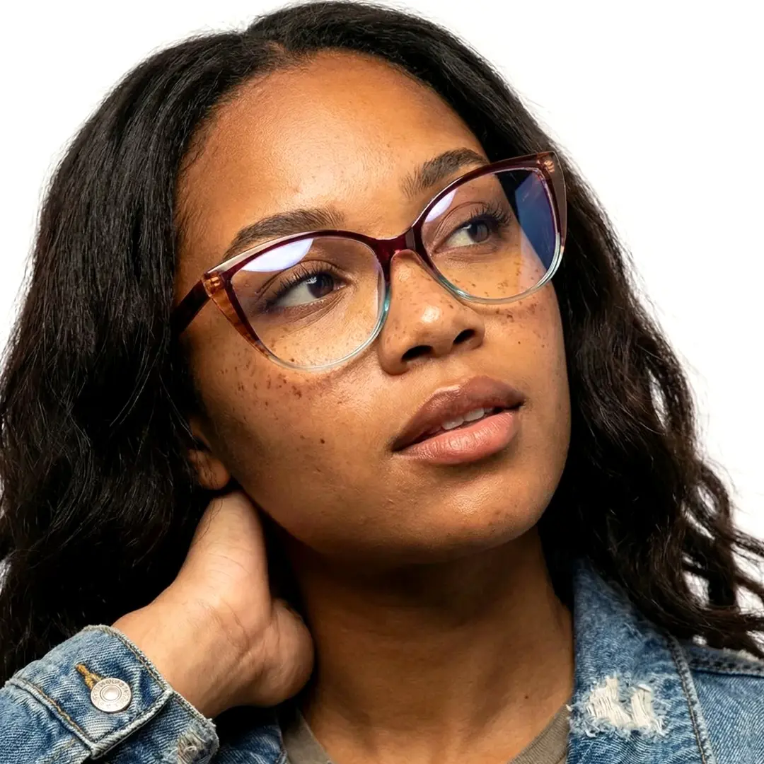 Front view of female wearing two-tone(purple and cear) cat eye eyeglasses, hand resting on forehead, thoughtful expression, CR0172307