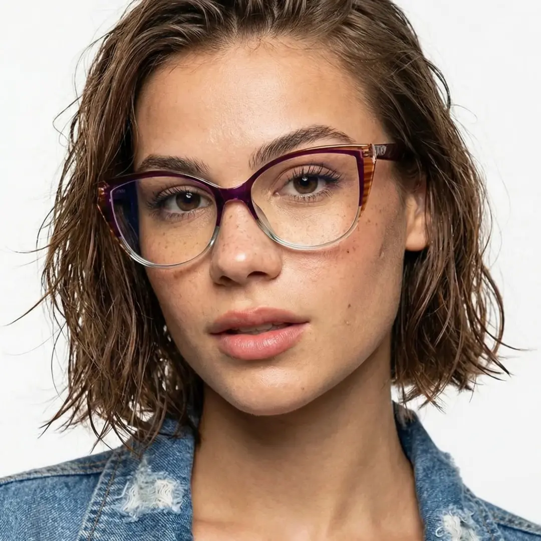 Front view of female wearing two-tone(purple and cear) cat eye eyeglasses, tilting head, neutral expression, CR0172307
