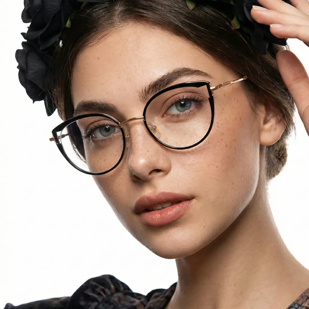 Front view of female wearing black cat eye eyeglasses, relaxed expression, CR0182411