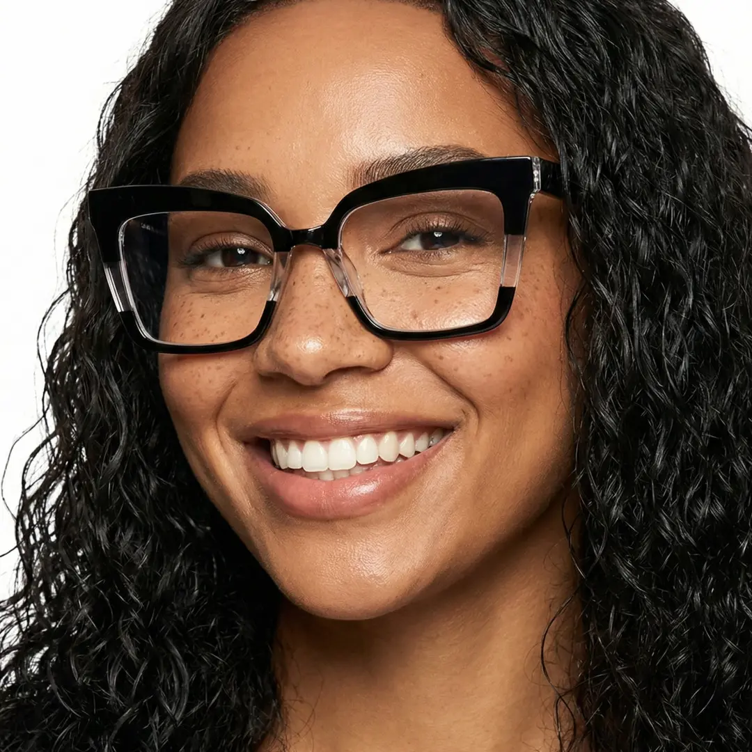 Front view of female wearing colorful black cat eye eyeglasses, smiling, CR0202404