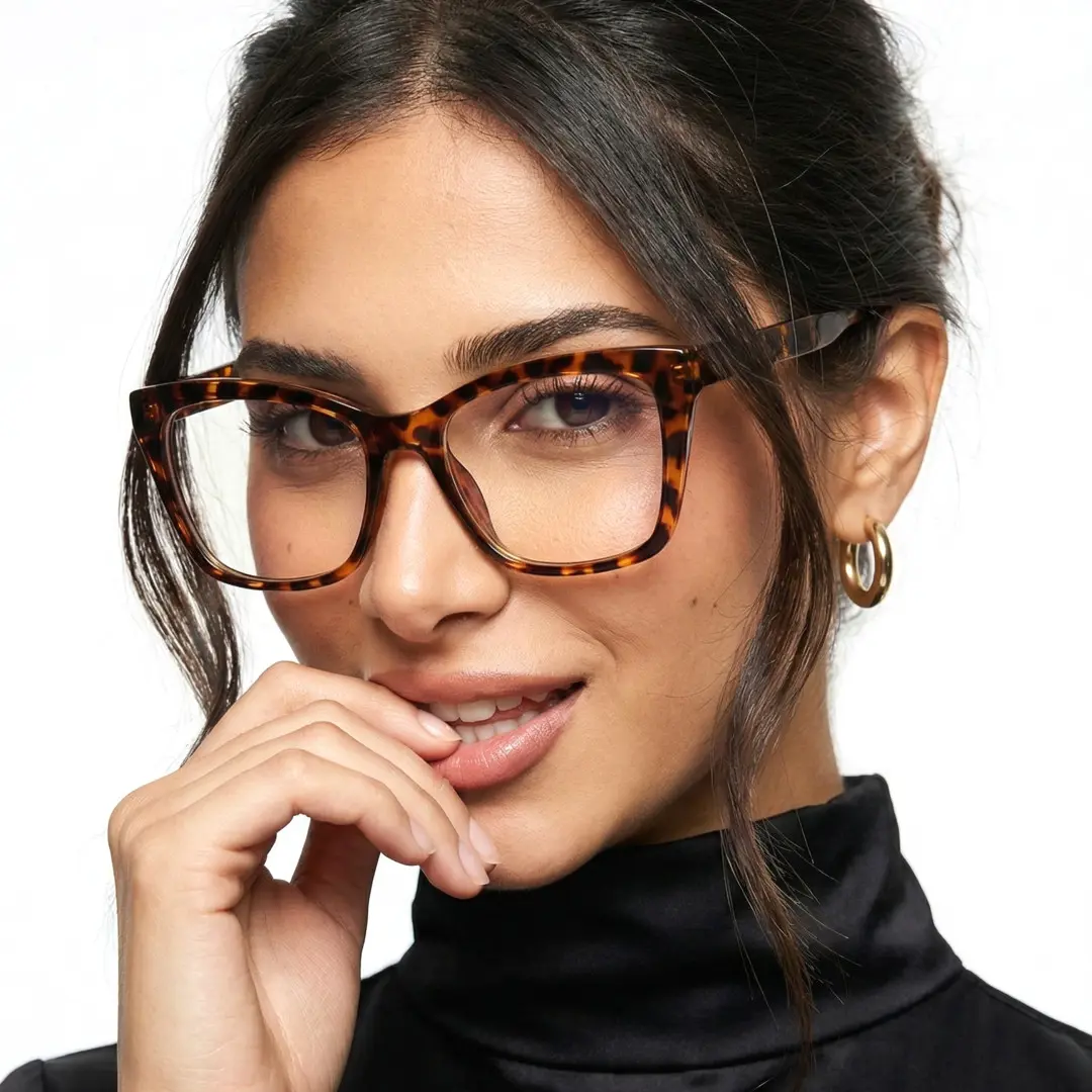 Three-quarter view of female wearing tortoise cat eye eyeglasses, hand near face, CR0212502