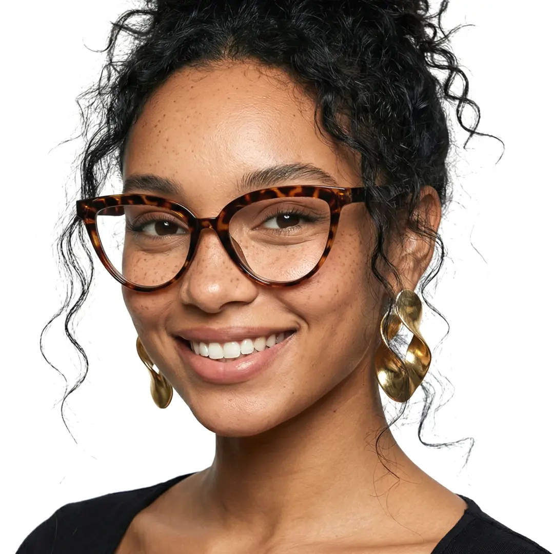 Slightly angled view of female wearing tortoise cat eye eyeglasses, natural smile, CR0222411