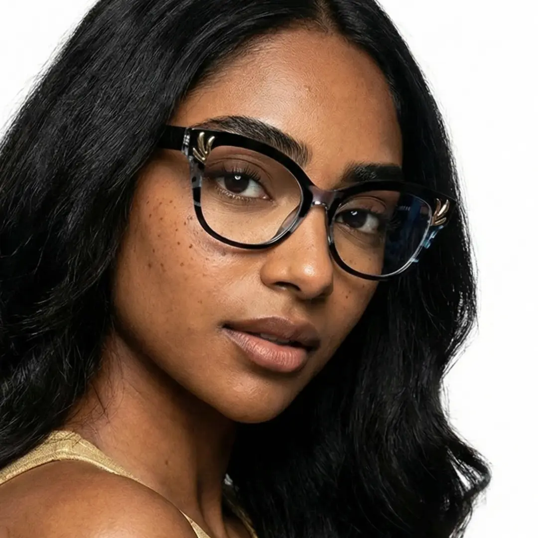 Over-the-shoulder view of female wearing black cat eye eyeglasses, smiling, CR0232408