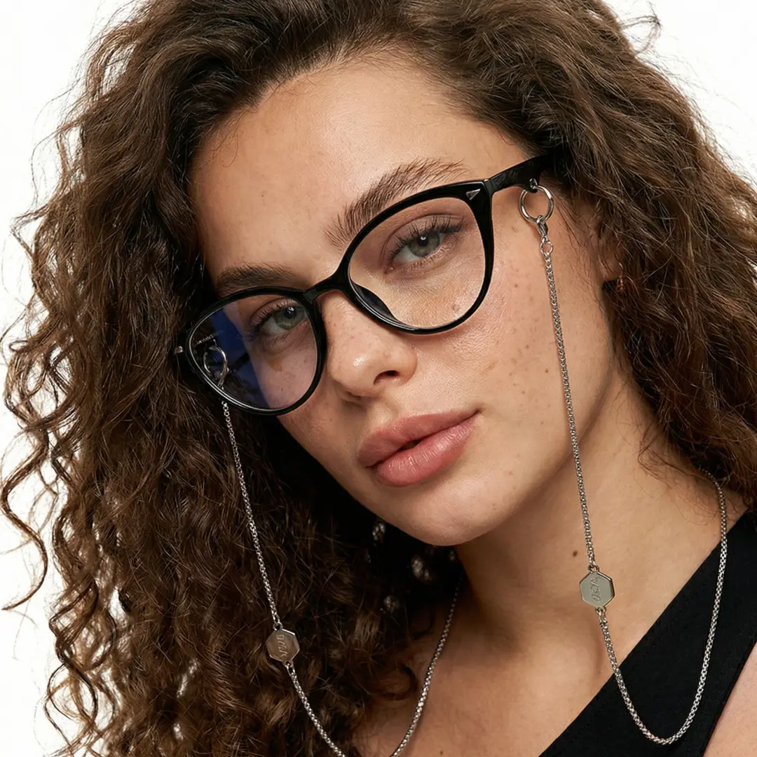 Front view of female wearing fashion black cat eye eyeglasses, neutral expression, CR0232601
