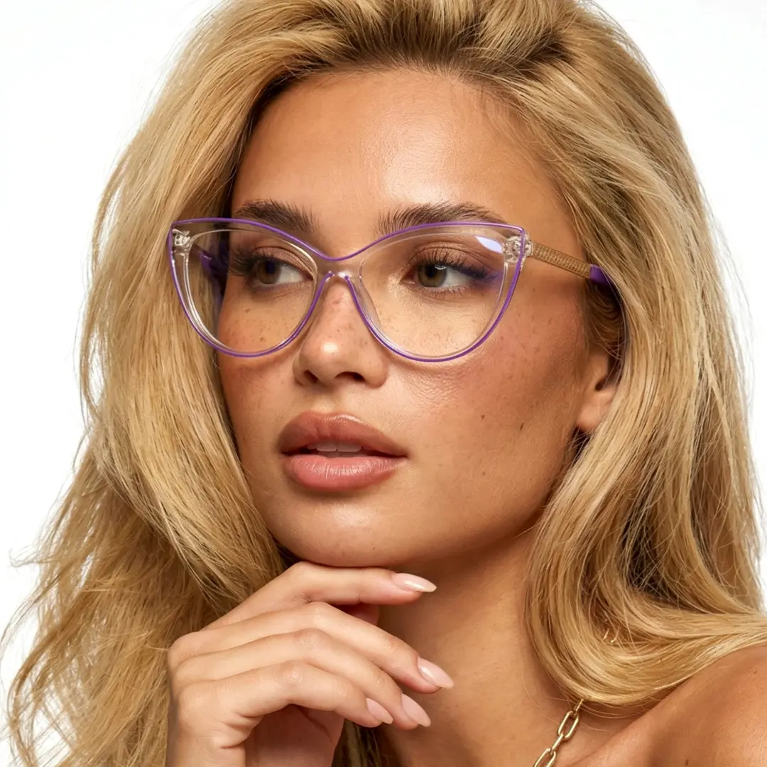 Looking away view of female wearing purple cat eye eyeglasses, resting chin on hand, CR0242408