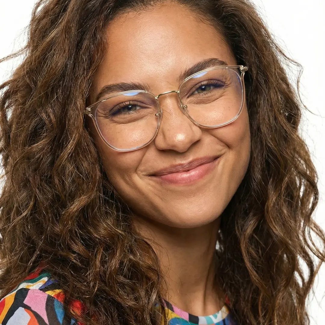 Front view of female wearing clear cat eye eyeglasses, smiling, CR0252502