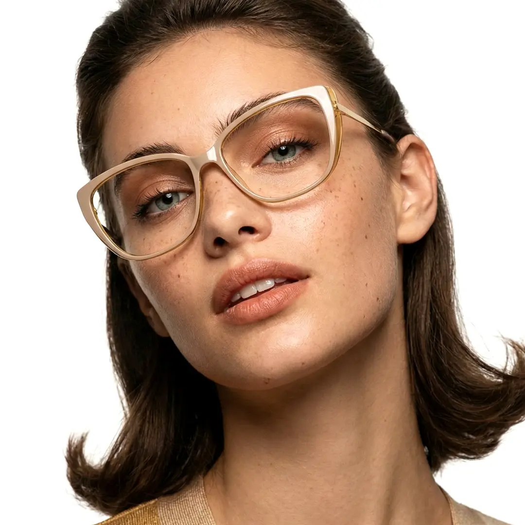 Tilted head view of female wearing beige cat eye eyeglasses, neutral expression, CR0262310