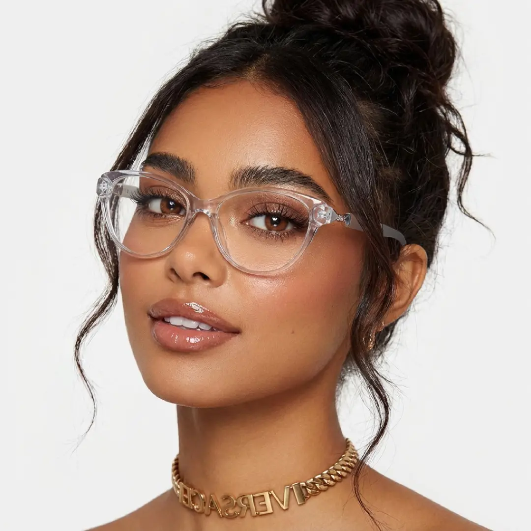 Profile view of female wearing grey cat eye eyeglasses, smiling, CR0302509