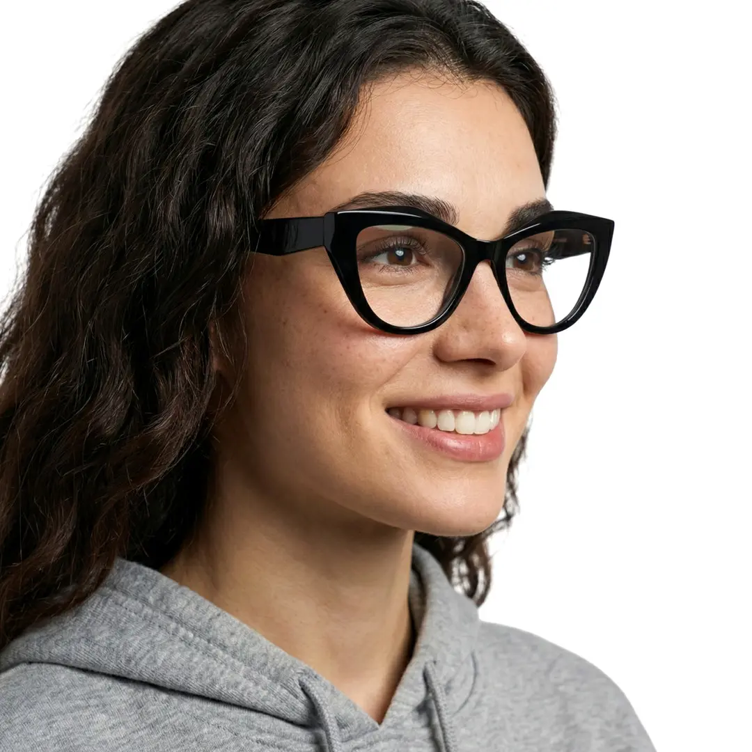 Profile view of female wearing black cat eye eyeglasses, smiling, CR0312405