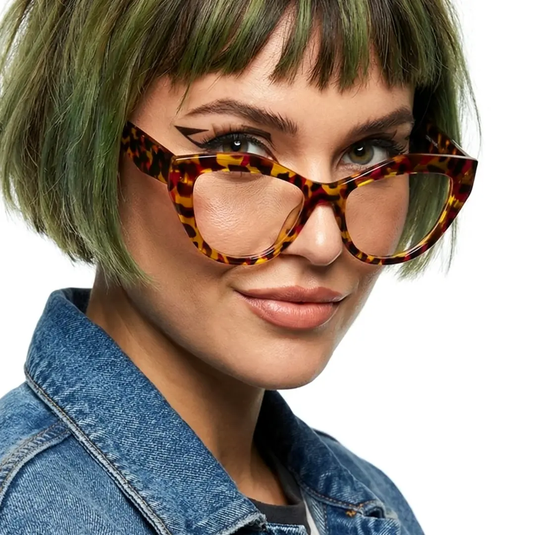 Front view of female wearing tortoise cat eye eyeglasses, confident expression, CR0312405