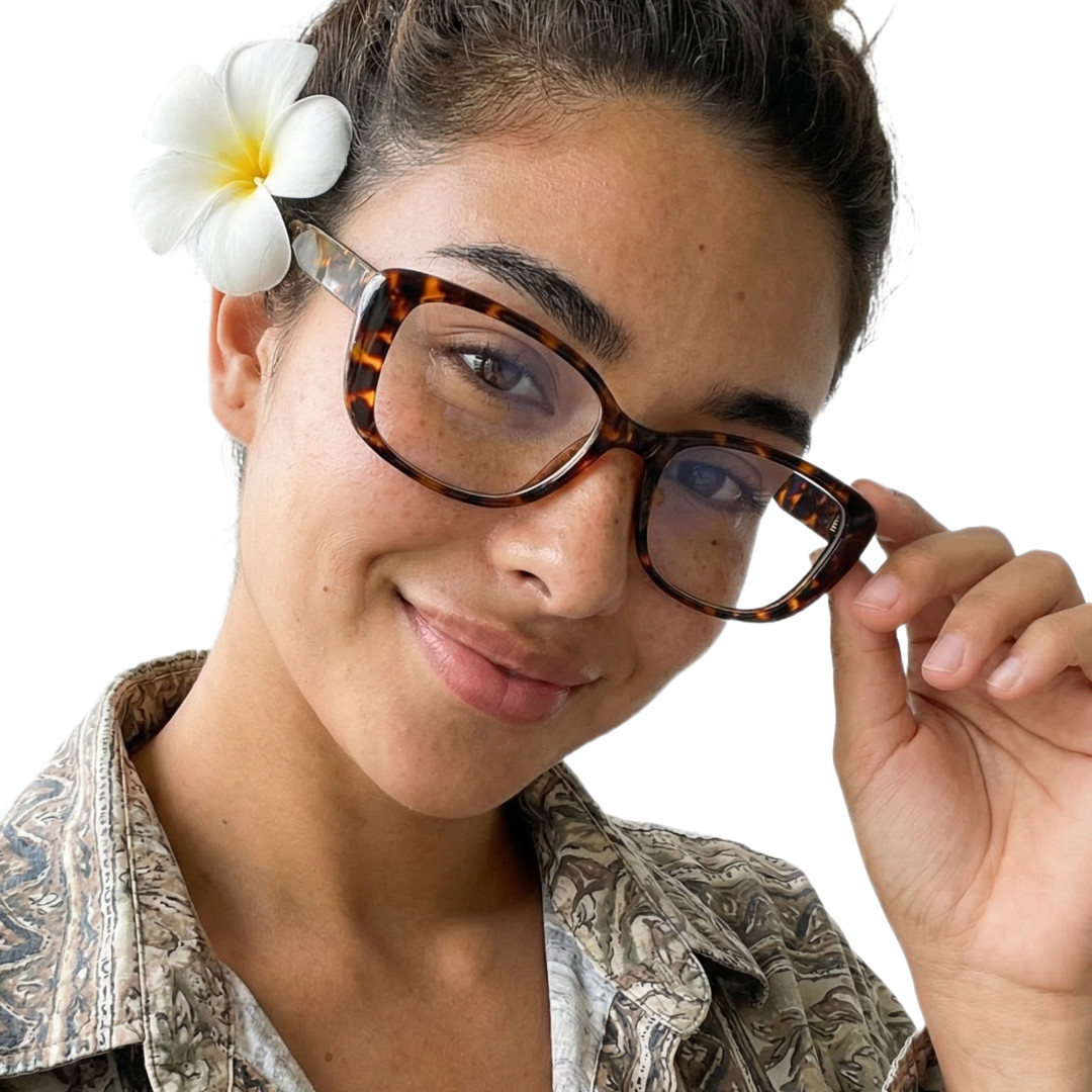 Front view of female wearing y2k tortoise cat eye eyeglasses, tilting head, smiling, CR0332601
