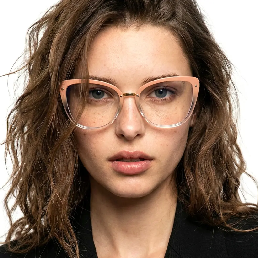 Front view of female wearing gold cat eye eyeglasses, neutral expression, CR0342302
