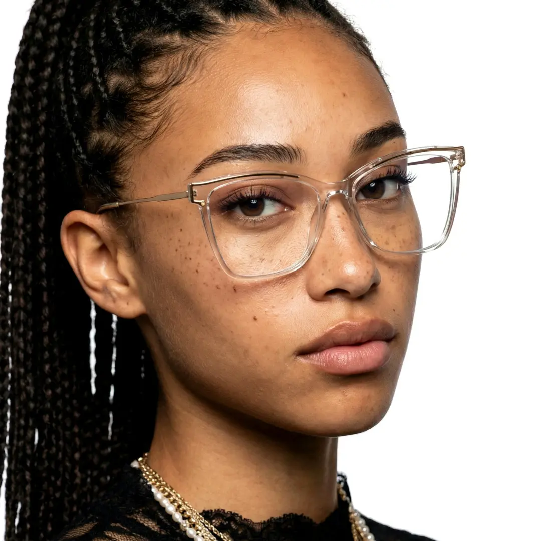 Front view of female wearing clear cat eye eyeglasses, neutral expression, CR0352503