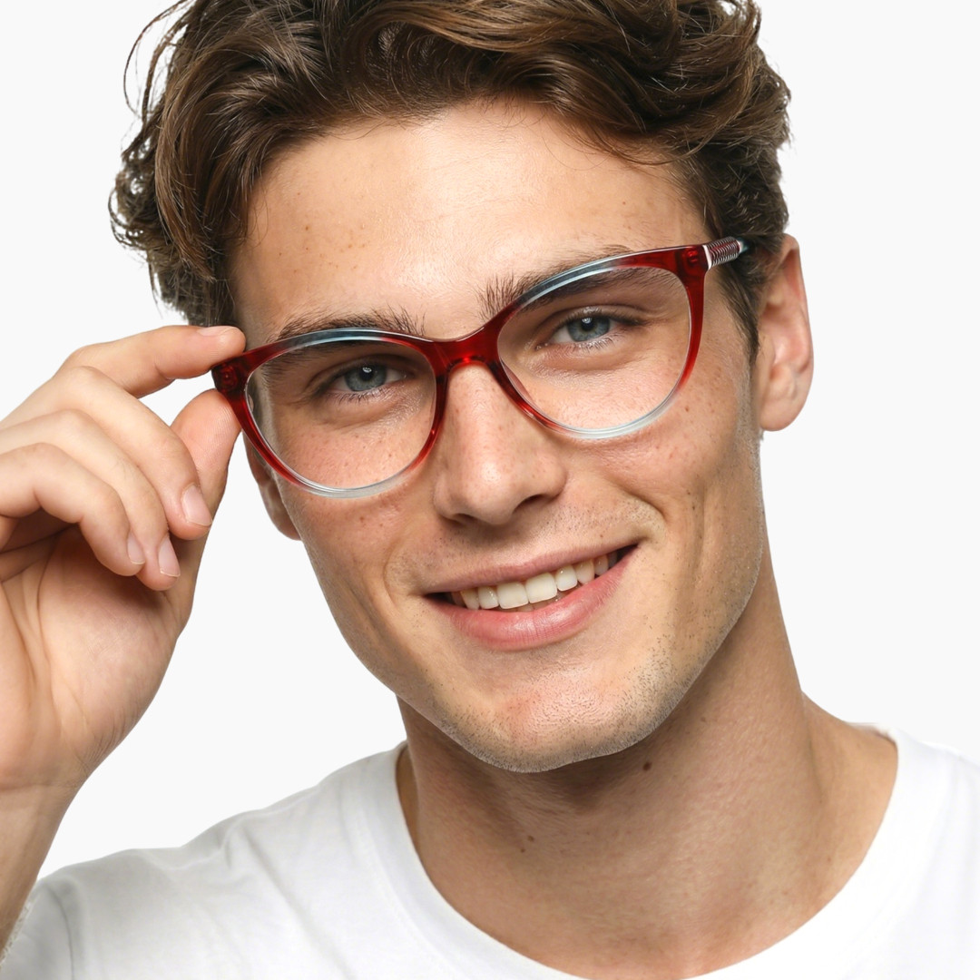 Front view of female wearing red cat eye eyeglasses, friendly smile, CR0372302