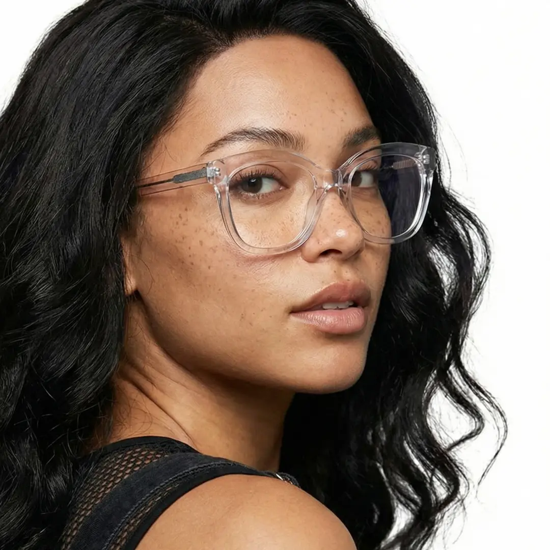 Over-the-shoulder view of female wearing clear cat eye eyeglasses, neutral expression, CR0532505