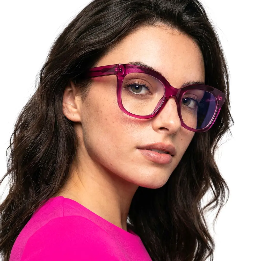 Over-the-shoulder view of female wearing pink cat eye eyeglasses, natural smile, CR0532505