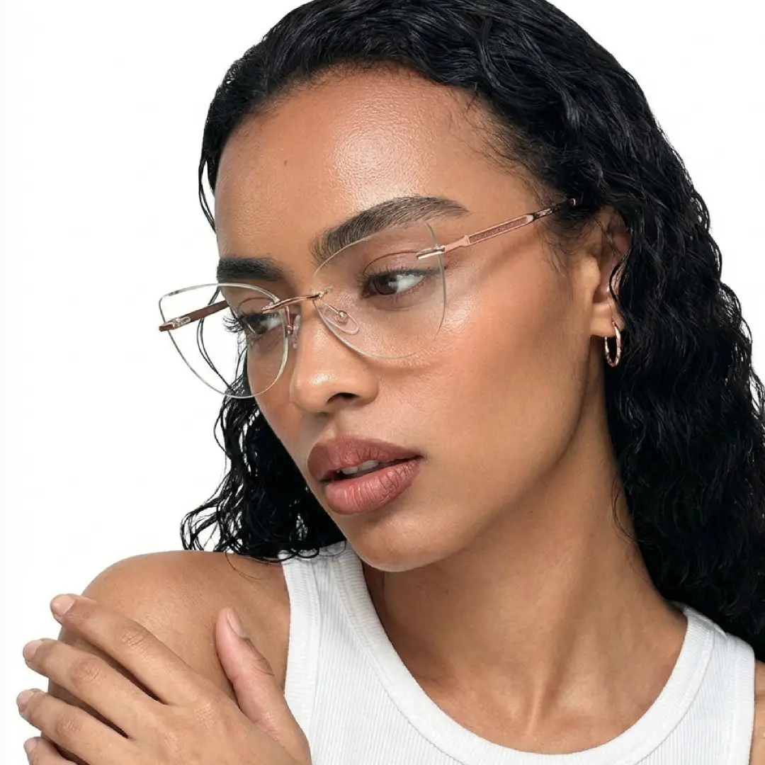 Looking away view of female wearing pink cat eye eyeglasses, hand touching shoulder, relaxed expression, CX0102507
