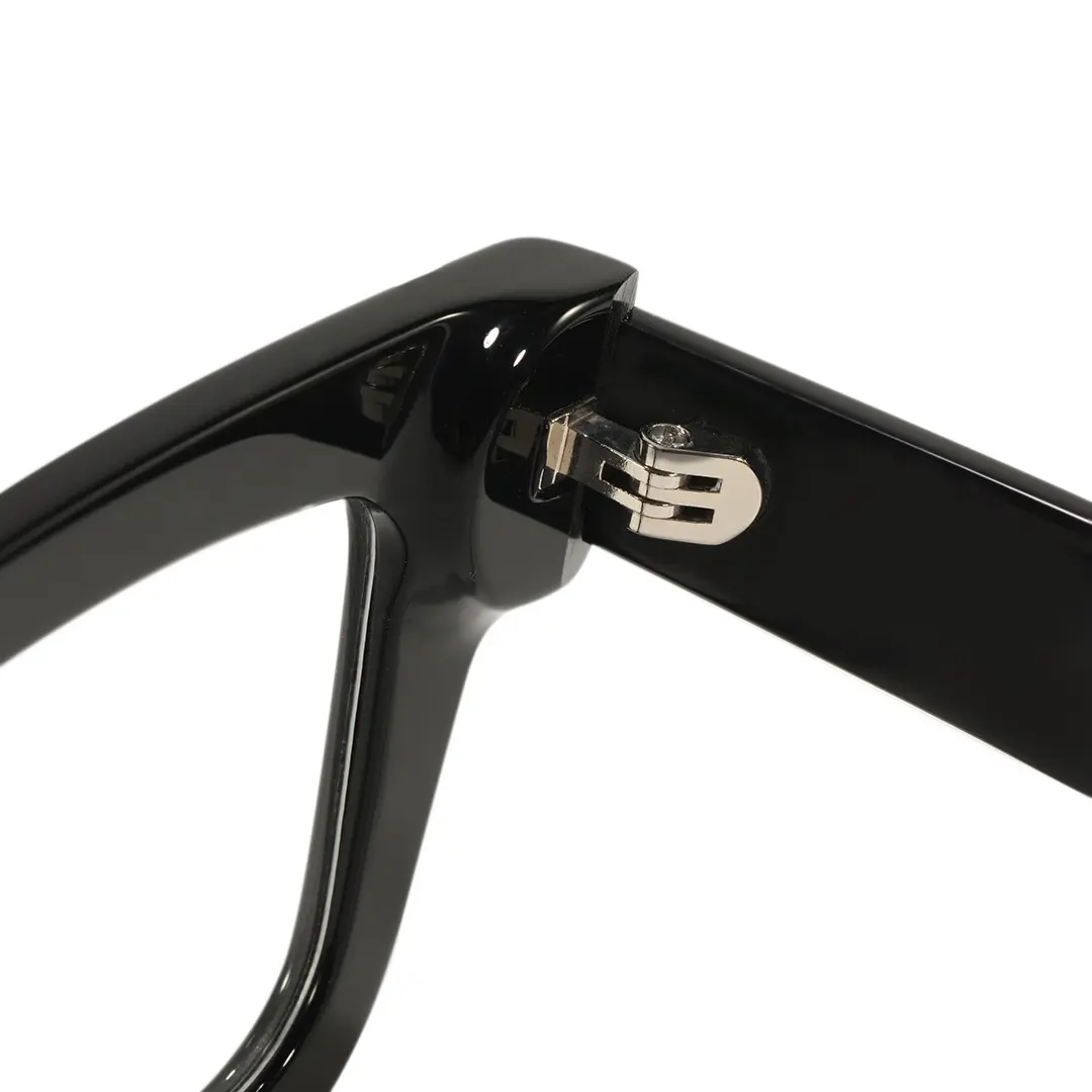 Hinge detail of Tavi rectangle acetate eyeglasses EA0052506 in black